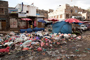 The garbage collectors and street cleaners have been on strike for over two weeks in the midst of the raining season. At Souq Assabah in the old city, piles of wet trash have taken over vegetables in volume and smell.