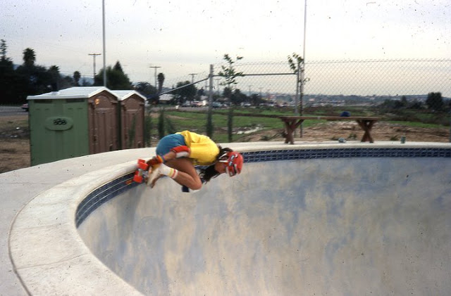 Kim getting coping again at the Spring Valley Skatepark.