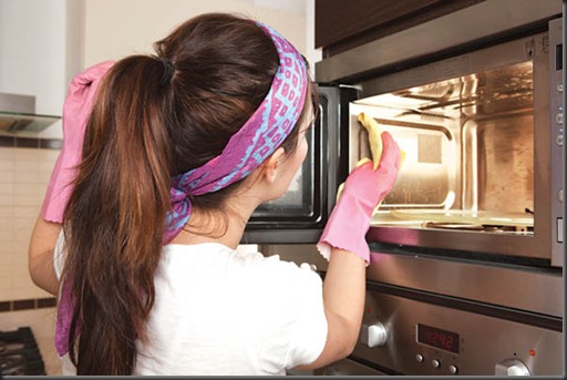 woman-cleaning-a-microwave