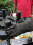 I'll just lower the press screw and apply pressure on the chopped apples.