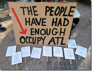 Occupy Atlanta signs UPI Photo Erik S. Lesser