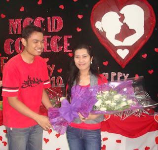 Sir Jerome presents bouquet of flowers to February Birthday Celebrant Ma'am Charmagne Gaspar