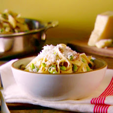 Tagliatelle with Smashed Peas, Sausage, and Ricotta Cheese