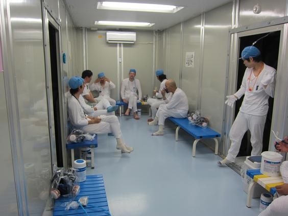 Workers at the Fukushima Daiichi nuclear plant take a break in the Hitachi/GE rest area, June 2011. TEPCO