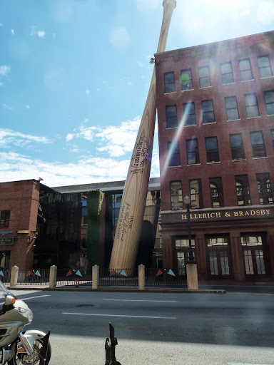 The kiddos who came to the wedding got mini Louisville Slugger bat keychains. Just down the street is the factory, where a massive bat sits in front of the building. The kiddos who came to the wedding got mini Louisville Slugger bat keychains. Just down the street is the factory, where a massive bat sits in front of the building.