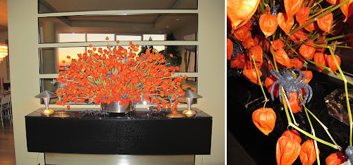 This gorgeous orange arrangement was littered spooky surprises. The black glitter caught the light in such a hauntingly perfect way. This gorgeous orange arrangement was littered spooky surprises. The black glitter caught the light in such a hauntingly perfect way.