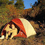 Nick soaks up the evening sun at the campsite