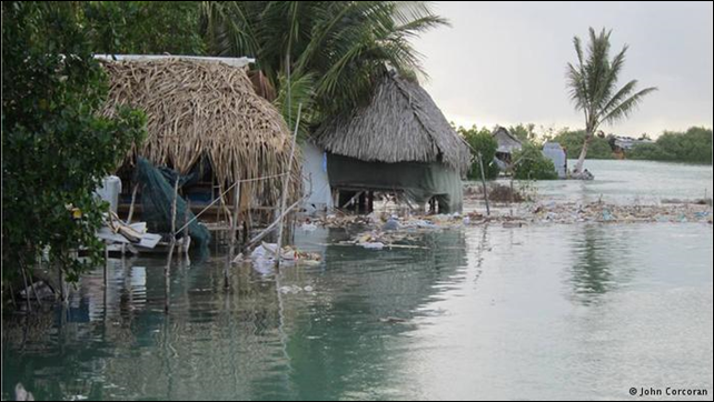Homes on Kiribati flooded by rising sea level. Kiribati native Ioane Teitiota's appeal for climate refugee status in Auckland High Court has been deined. University of Waikato PhD candidate and Kiribati native John Corcoran presented photographic evidence to Auckland's High Court in support of Teitiota's claim. Photo: John Corcoran