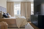 25 - Master bedroom with bespoke joinery units.jpg