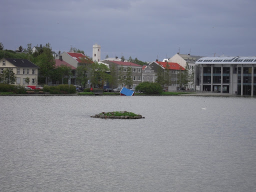Looks like that house-in-water art exhibit gets moved around. How very modern?