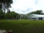 Major wind storms and hurricanes threatened the plans of Katy and Jeff's outdoor ceremony and cocktail hour. So the couple and their planner, Kristin Newman of Kristin Newman Designs, decided to extend the tent as a rain plan.