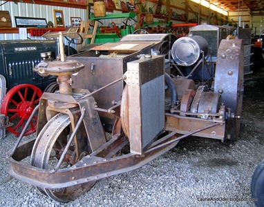 Three Wheeled Tractor with arrow