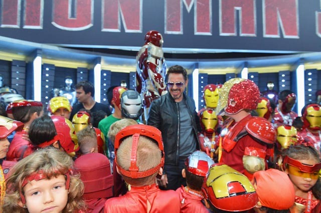 SAN DIEGO, CA - JULY 14:  Actor Robert Downey Jr. poses with fans at Marvel Studios booth during Comic-Con International 2012 at San Diego Convention Center on July 14, 2012 in San Diego, California.  (Photo by Alberto E. Rodriguez/WireImage) *** Local Caption *** Robert Downey Jr.