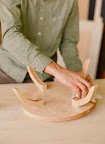 The cake stand was constructed from light wood. The cake stand was constructed from light wood.