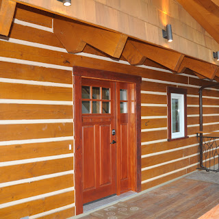 Entrance / porch of the Ecolog show home in Central Saanich with artistic railing