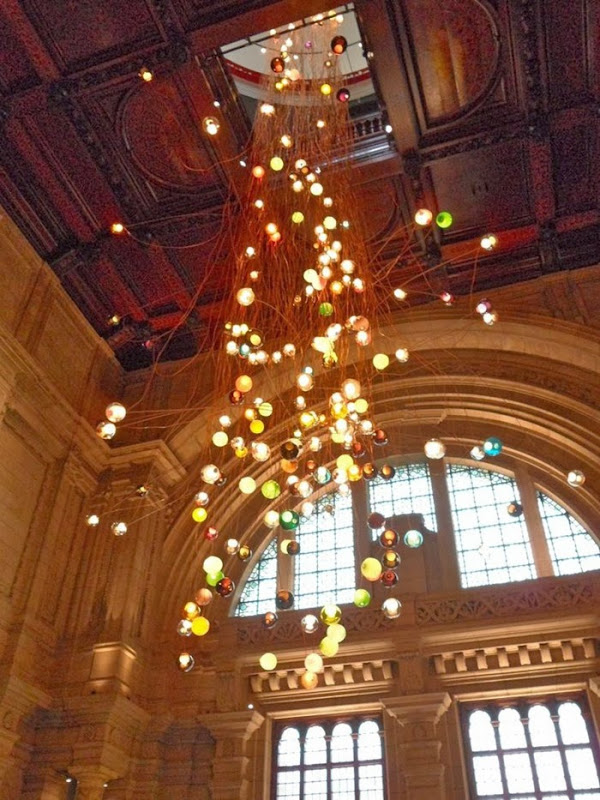 Enter through the main entrance of the V&A and immediately look up.