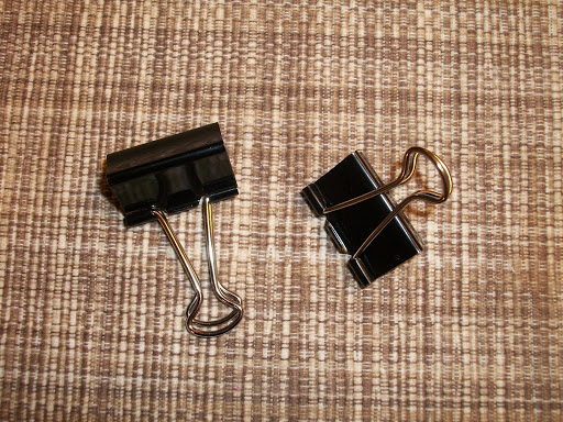 You can use a binder clip to secure the bags as well.