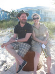 Art director Daniel Biasatti and real weddings editor Shira Savada also toast the newlyweds and successful photo shoot.