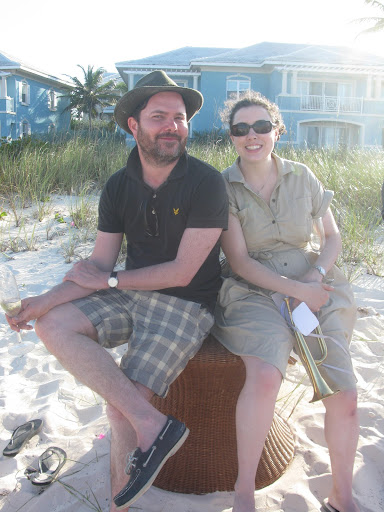Art director Daniel Biasatti and real weddings editor Shira Savada also toast the newlyweds and successful photo shoot.