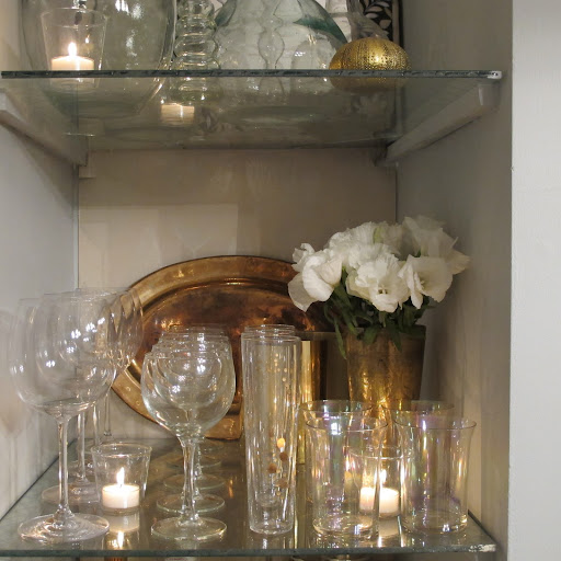 I edited down my glass collection. (I really didn't need those pint glasses anymore). Now you can really appreciate the shape of each piece.