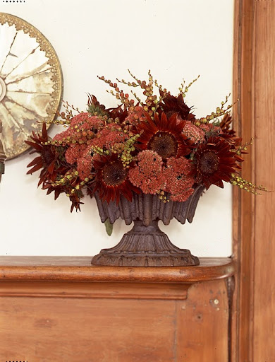 Another beautiful shade of red used in a centerpiece -- this arrangement would look gorgeous on your dining table or on a buffet table. Another beautiful shade of red used in a centerpiece -- this arrangement would look gorgeous on your dining table or on a buffet table.