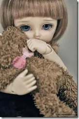 Sad-doll-girl-alone-cute-with-teddy-hug