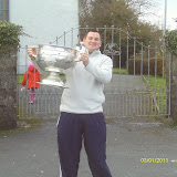 Puc Fada champion with a football trophy, Colin O Sullivan