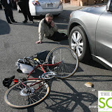 CyclistHitsCarOn18Ave57StreetShimonGifter