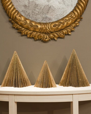 These Magazine Christmas trees are made from old magazines that are glittered-so clever. (marthastewart.com) These Magazine Christmas trees are made from old magazines that are glittered-so clever. (marthastewart.com)