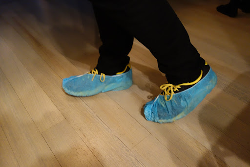 I ask that all the staff wear the booties until just before the guests arrive as I like to keep the floor as clean as possible.