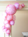 Our tissue poms, mid-installation.