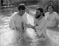 c0 Russian Orthodox pilgrims baptized in the Jordan River near Jericho; from http://www.cnewa.org/.