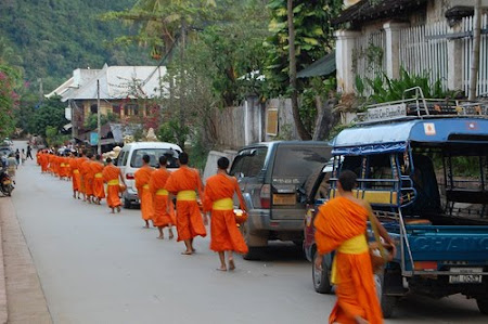 Laos: Monks receiving alms Laos