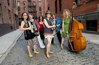 The all-woman klezmer band Isle of Klezbos is photographed in a portrait and in performance at the 92Y Tribeca in New York City on July 26, 2011...Photo by Angela Jimenez .www.angelajimenezphotography.com