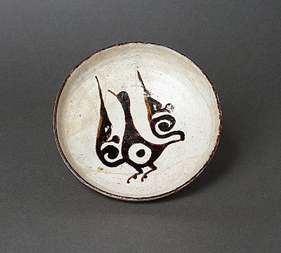 Plate Iran, Nishapur Plate, 10th century Ceramic; Vessel, Earthenware, white slip, slip-painted in black under a transparent glaze, 1 3/4 x 5 1/2 in. (4.45 x 13.97 cm) The Nasli M. Heeramaneck Collection, gift of Joan Palevsky (M.73.5.129) Art of the Middle East: Islamic Department.