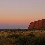 A Slowly Rising Moon And Uluru At Sundown - Yulara, Australia