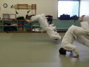 Jesse in background, flying through the air.
