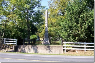 Monument and Gravesite for Corporal Rihl across from the marker.