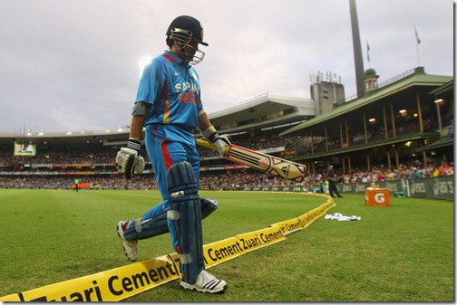 Sachin Tendulkar of India walks off the pitch after being run out by David Warner of Australia during the One Day International match between Australia and Indiaa