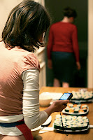 Shelley taking a photo of her sushi