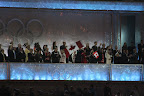 Dignitaries applauding the arrival of the athletes