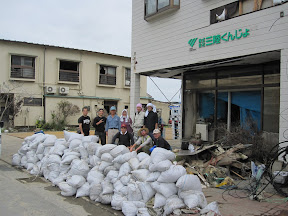 All the sandbags we removed from the building and part of the team united!