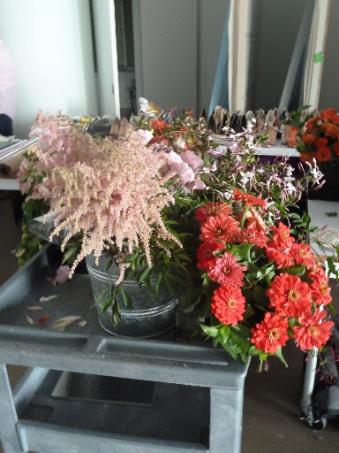 Another cart of flowers, including astilbe and zinnias.