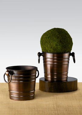 Antique copper ice buckets.