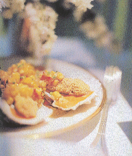 Oysters fried with cornmeal, served with red-pepper mayonnaise and a spicy maquechoux, which is made of jalapeno peppers and corn. (Martha Stewart Living) Oysters fried with cornmeal, served with red-pepper mayonnaise and a spicy maquechoux, which is made of jalapeno peppers and corn. (Martha Stewart Living)