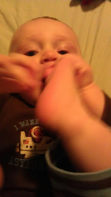 Charlie eating his foot