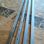 all the steel cut to size, drilled and brushed - ready to weld! 2011-07-08 13.25.52.jpg