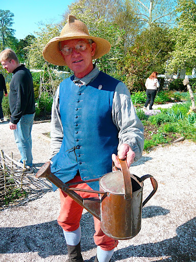 Colonial Nursery manager Don McElvey with a beautiful, period copper water can. Don works the grounds of the nursery tending the displays and know his stuff.