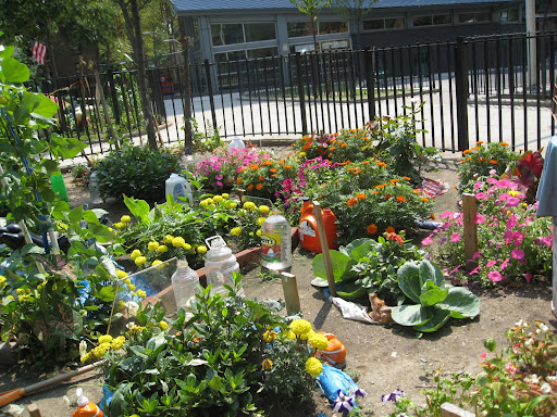 The jugs of water aren't there as part of the undersea theme - they are really for watering the garden, since there is neither spigot nor hose she can use.