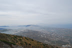 View of Santorini on a cloudy day from Profitis Illas Monastery